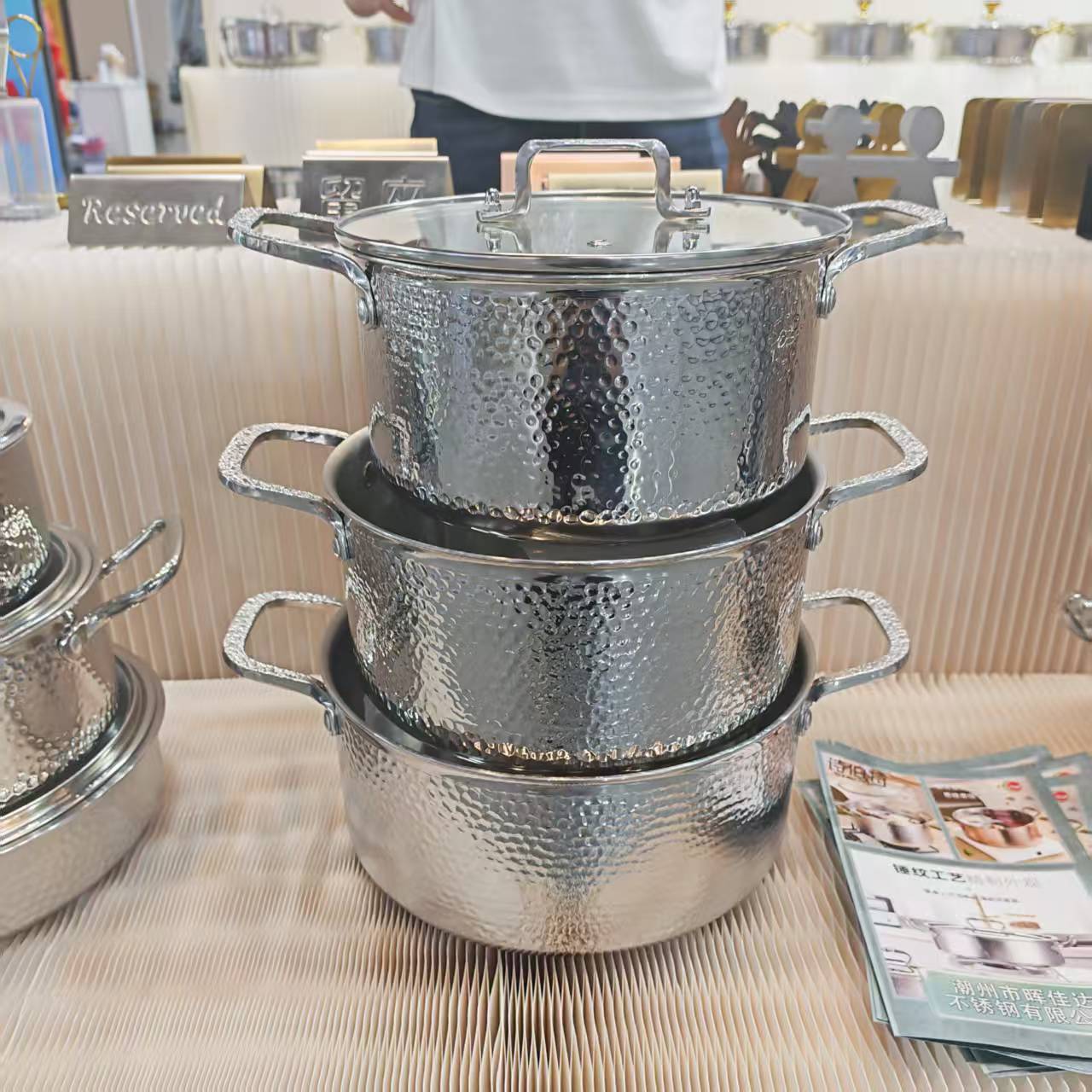 Three-layer clad cookware